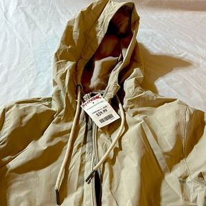 Brand new New Balance rain coat size Small.